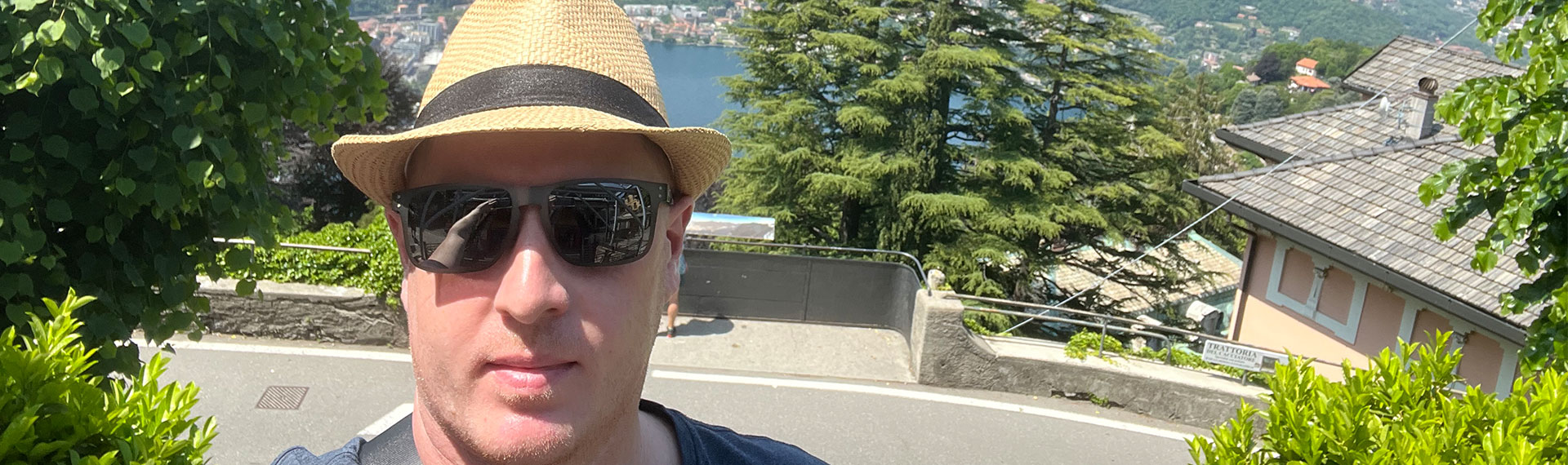 a man wearing sunglasses and a hat