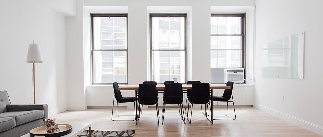 white room with three vertically sliding windows white room with three vertically sliding windows