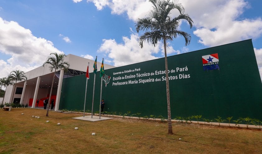 a green building with flags