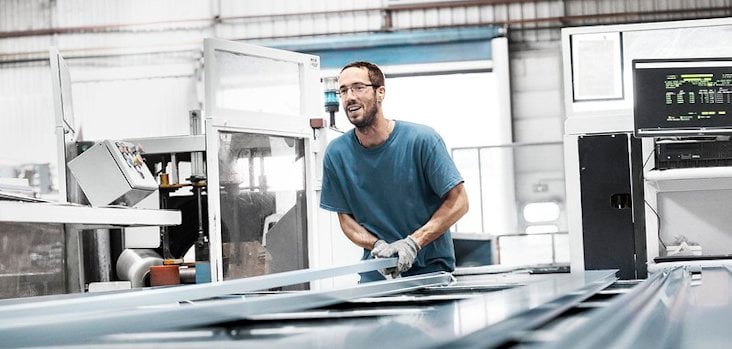 Hydro employee working with extrusions Hydro employee working with extrusions