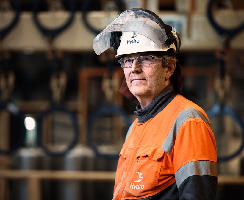 a man wearing a hard hat a man wearing a hard hat