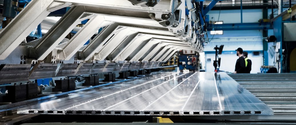 a person standing in a factory a person standing in a factory